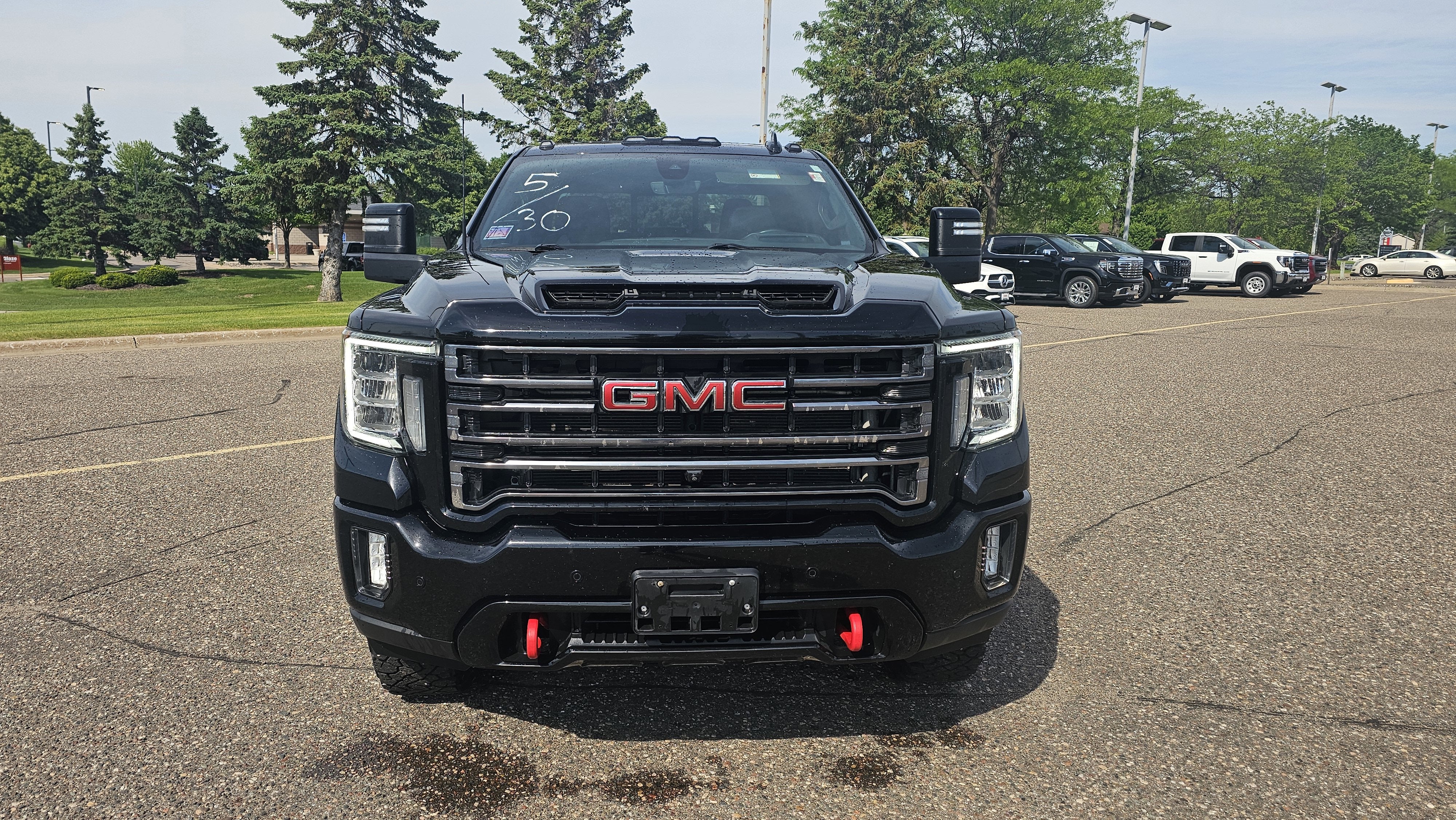 Used 2021 GMC Sierra 3500HD AT4 with VIN 1GT49VEY7MF182639 for sale in Minneapolis, Minnesota