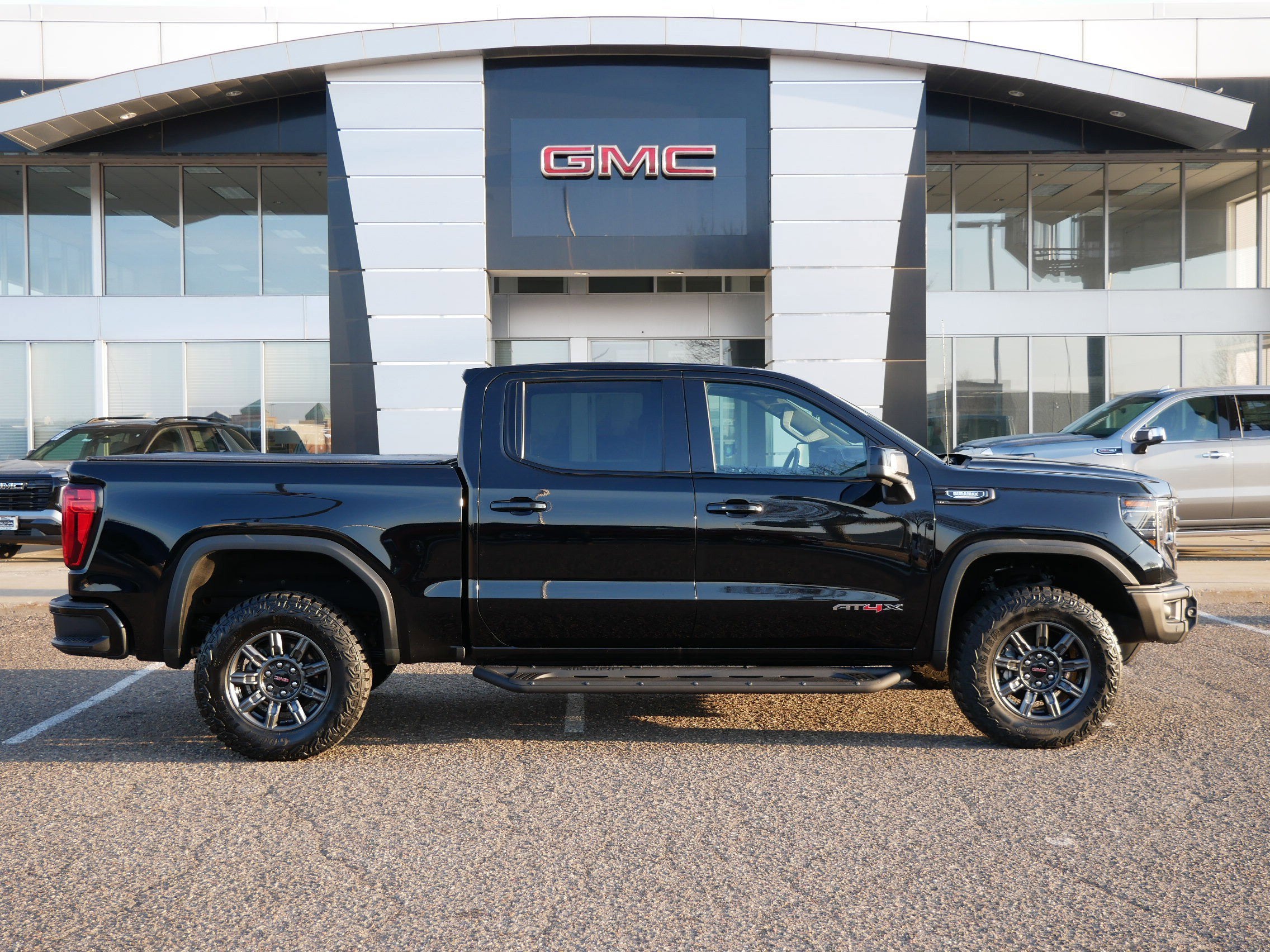 Used 2024 GMC Sierra 1500 AT4X with VIN 3GTUUFE86RG156706 for sale in Minneapolis, Minnesota